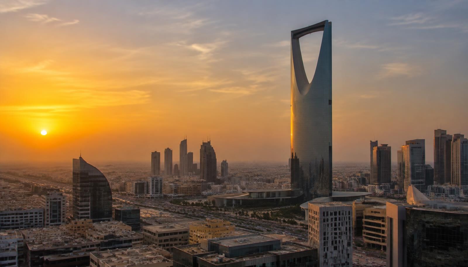 Riyadh skyline with Kingdom Centre tower at dusk